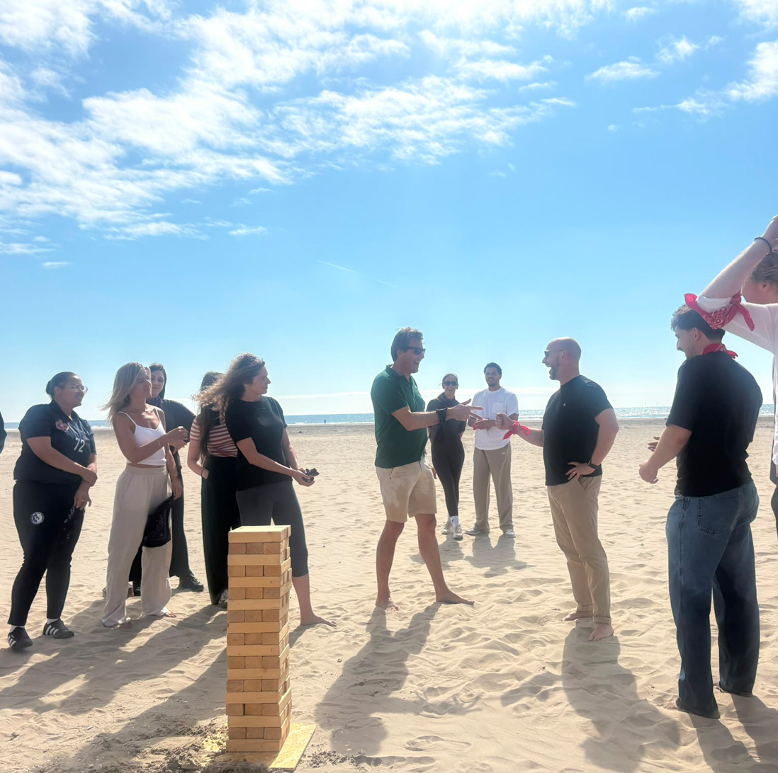 Levy Global team enjoying the beach in summer